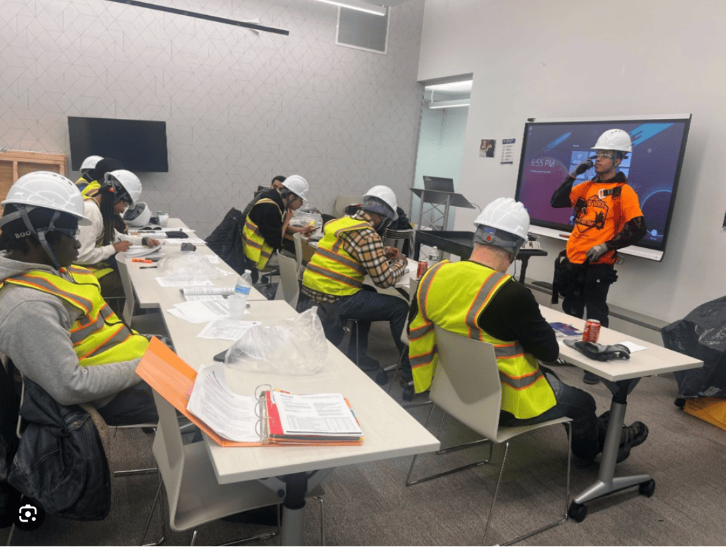 Construction employees participating in a skill development workshop