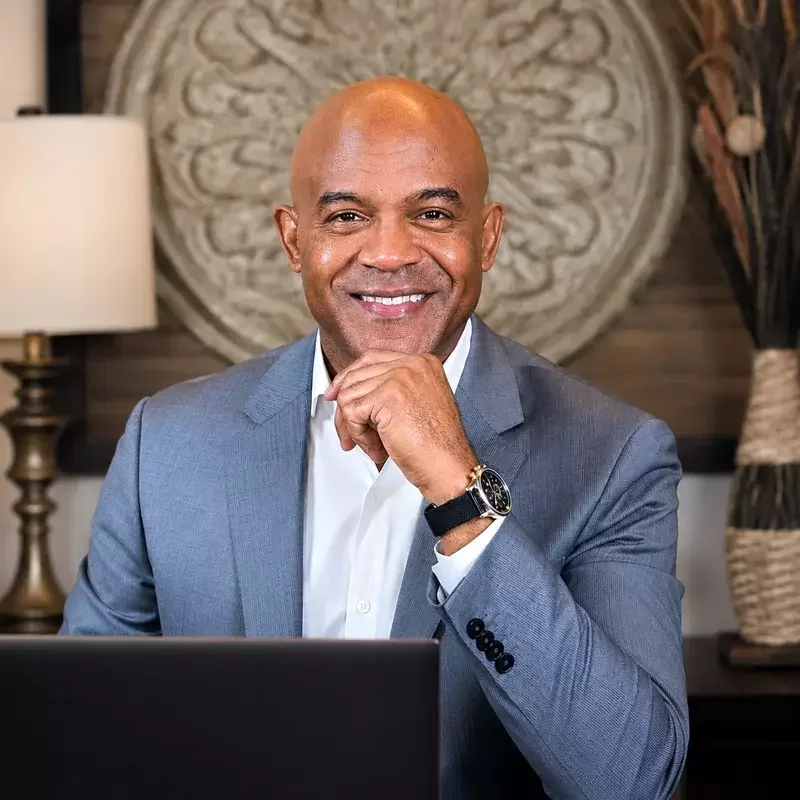 Robert O. Beverley working at his desk